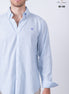 CAMISA LISA AZUL CLARO BORDADO MORADO