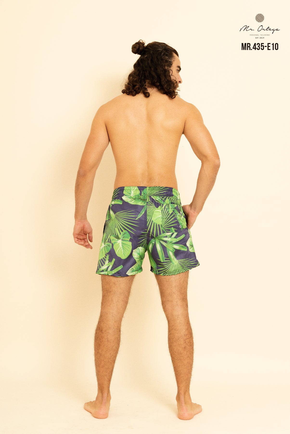 TRAJE DE BAÑO AZUL MARINO ESTAMPADO VERDE