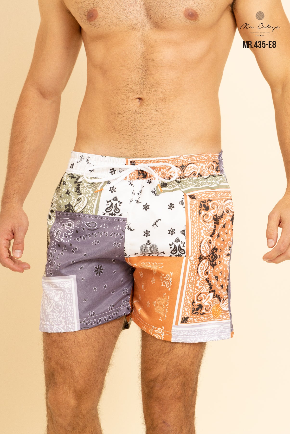 TRAJE DE BAÑO NARANJA, LILA Y VERDE